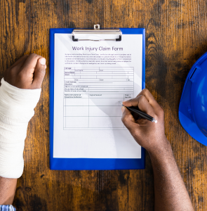 Independent agent reviewing disability insurance policy features with Cincinnati business owner